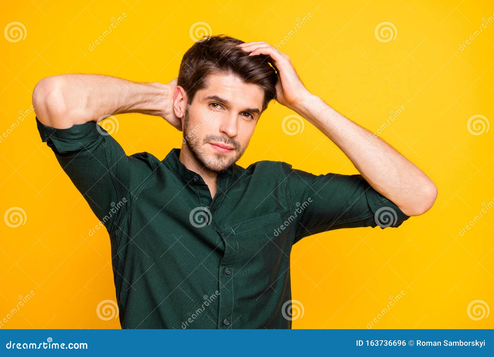 portrait of serious guy had bought new anti dander effect shampoo touch his hair look mirror feel thoughtful wear casual