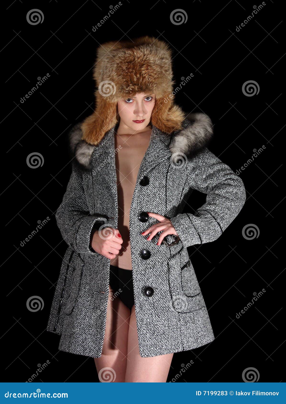 Portrait Of Sexual Girl In Gray Coat And Fur Hat Stock