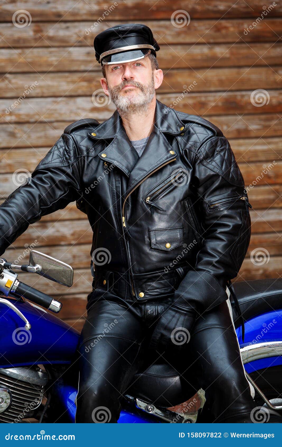 A Man in Black Leather Jacket Sitting Beside the Motorbike · Free Stock  Photo