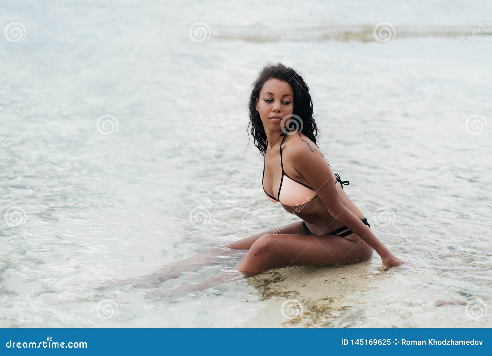 Portrait of Dark Skinned Afro American Girl with Big Breasts on Beach.  Stock Image - Image of young, fashion: 145169625