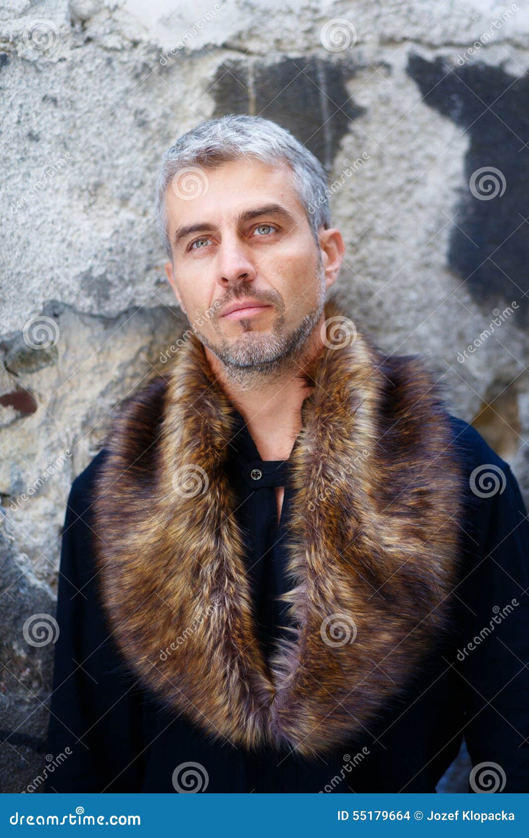 Portrait of a Man in Wolf Fur and Thoughtful Expression on His Face, a ...