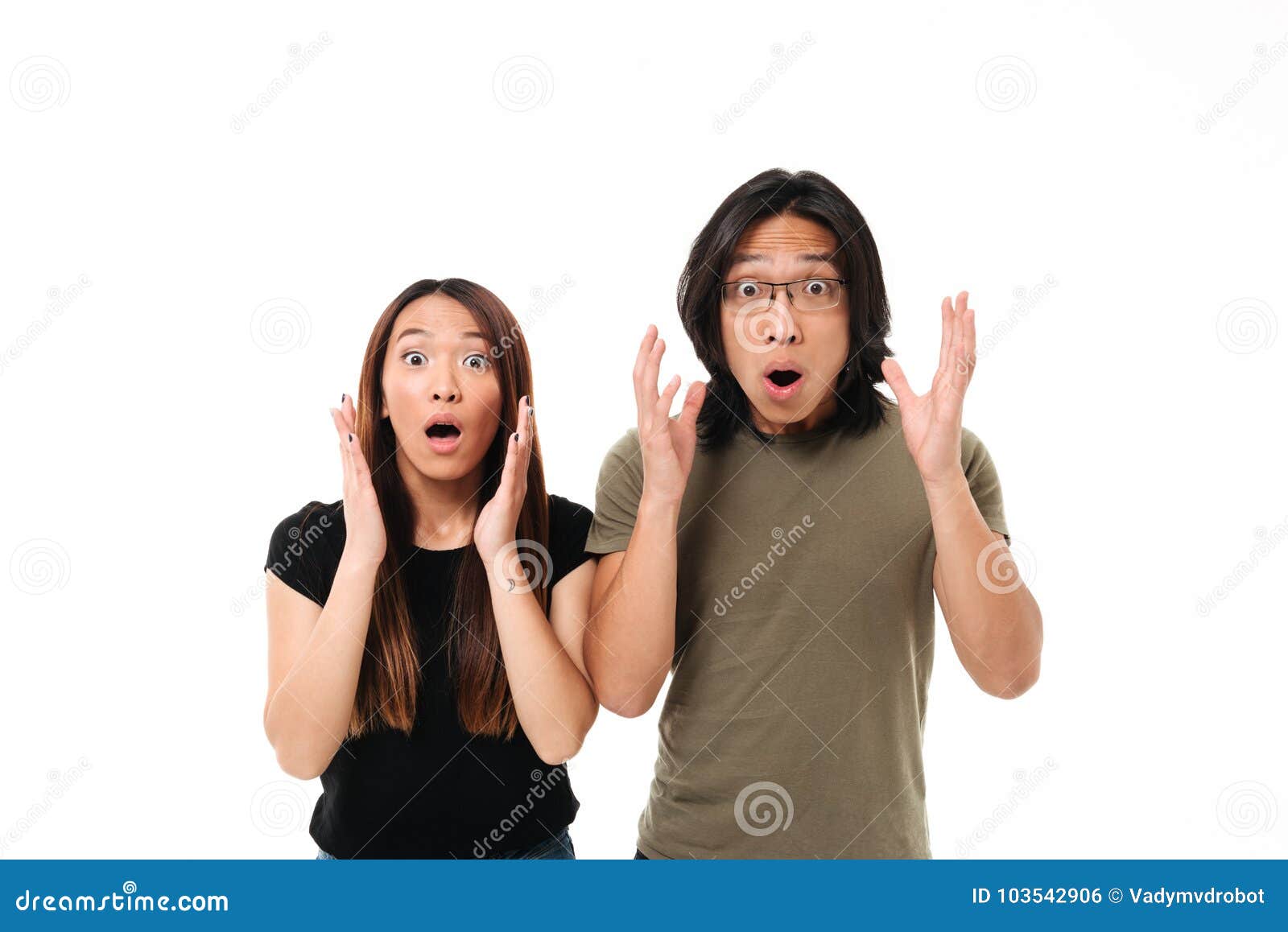Portrait Of A Shocked Young Asian Couple Stock Photo Im