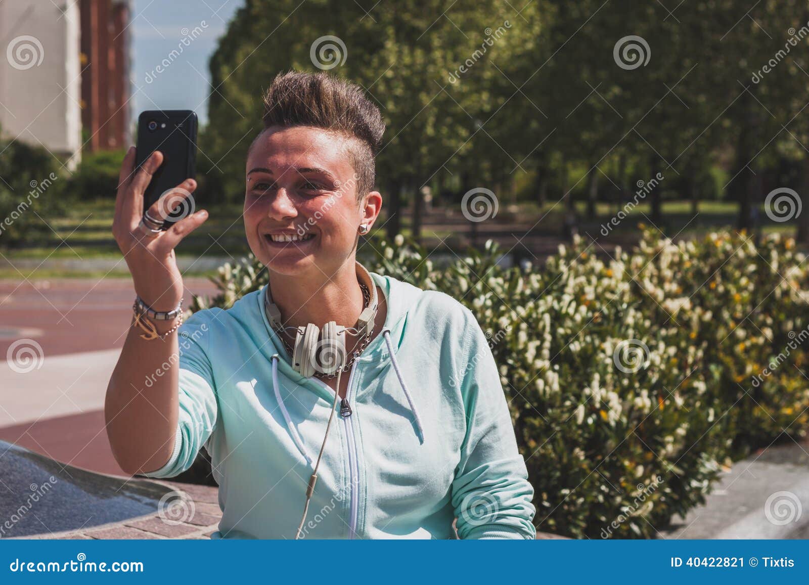Portrait Of A Short Hair Girl Taking A Selfie Stock Image
