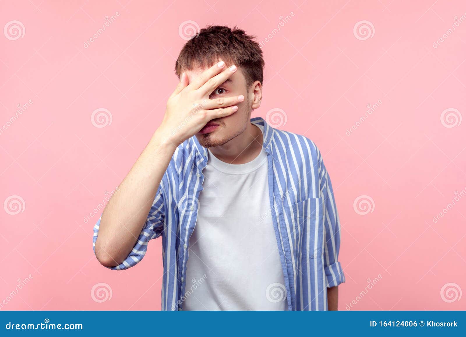 Portrait of Shy Curious Brown-haired Man Looking through His Fingers ...