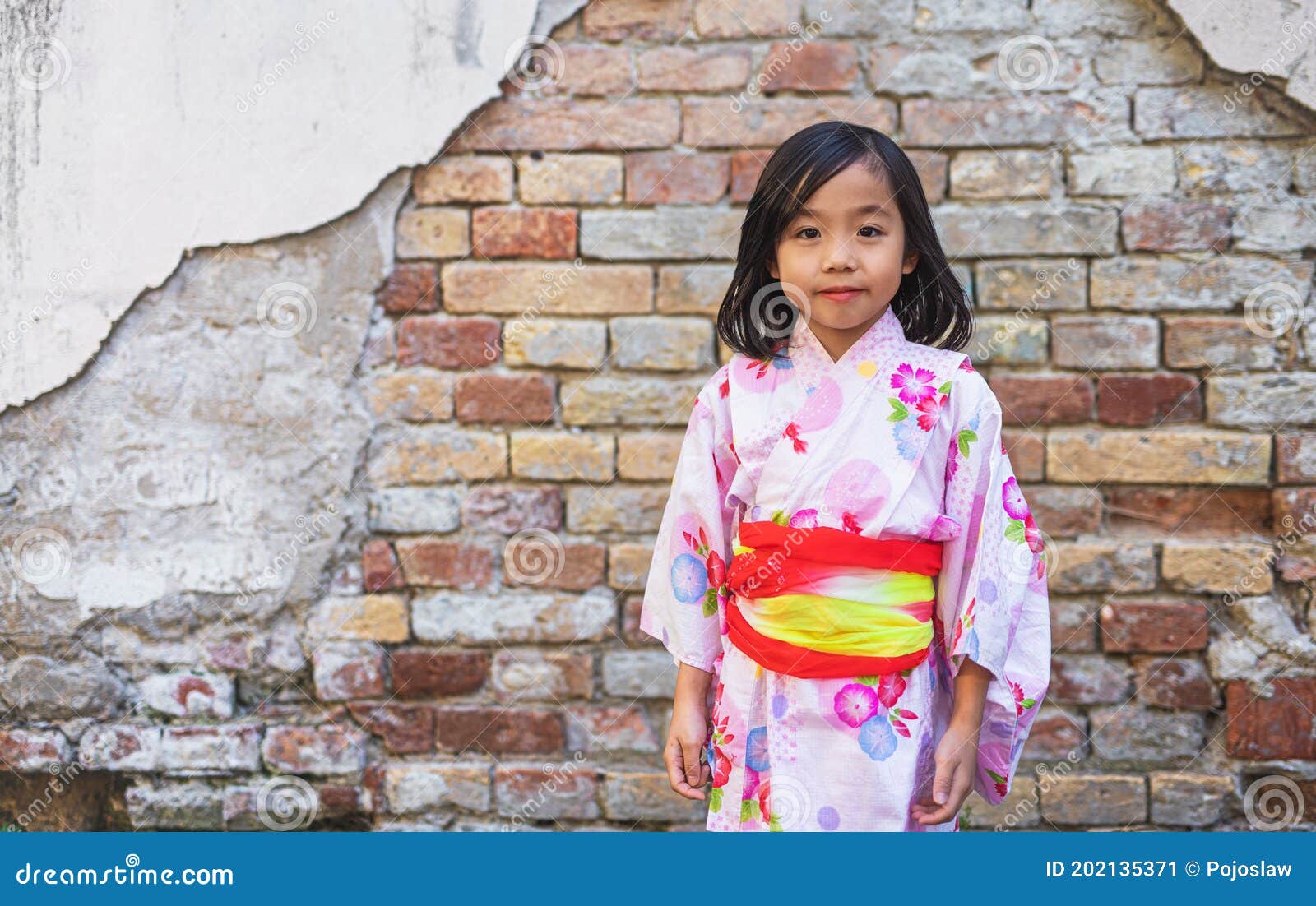 Portrait of Small Japanese Girl Wearing Kimono Outdoors in Town. Stock ...