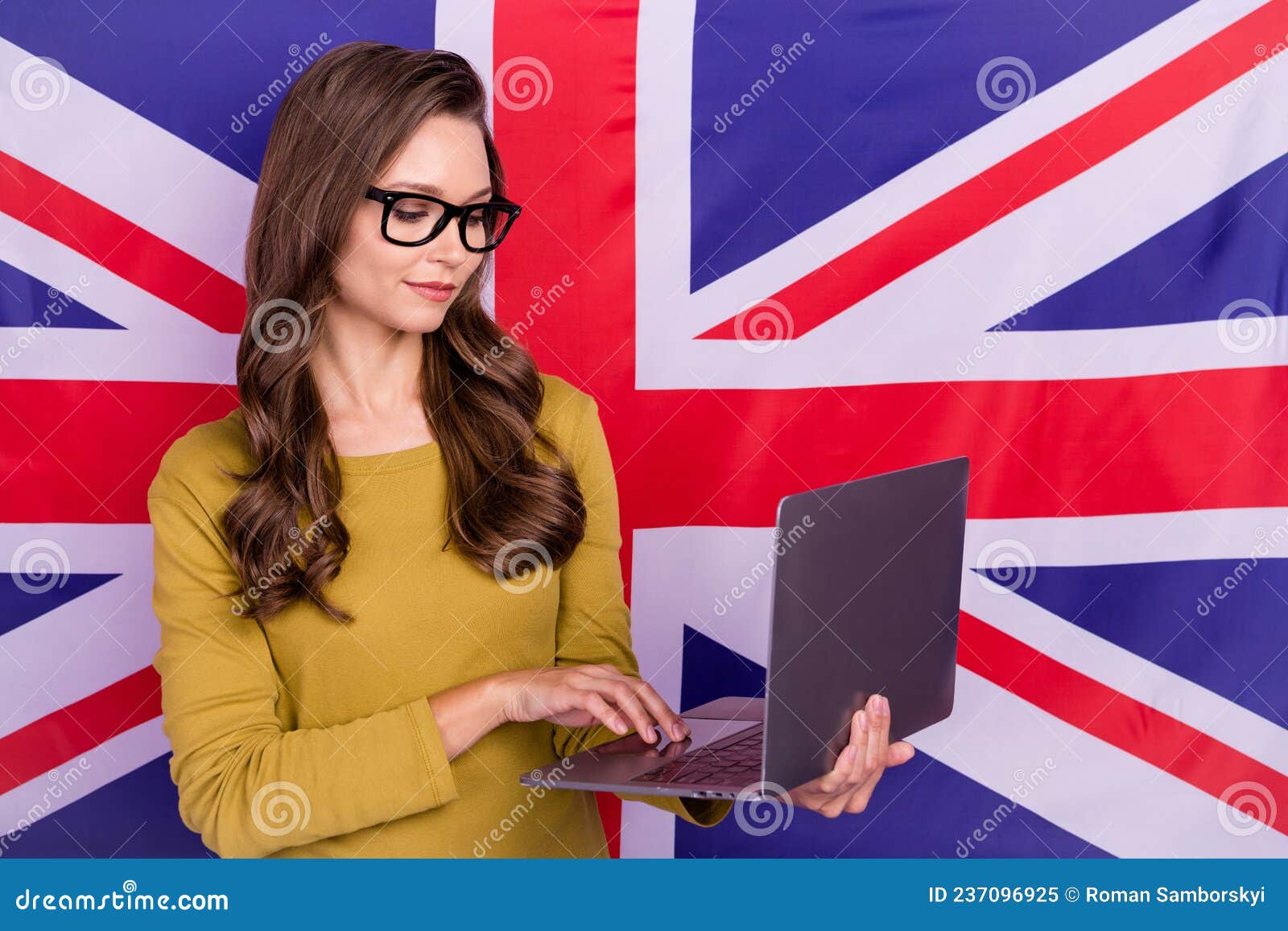 portrait of smart pretty person freelancer use digital netbook  on british flag background
