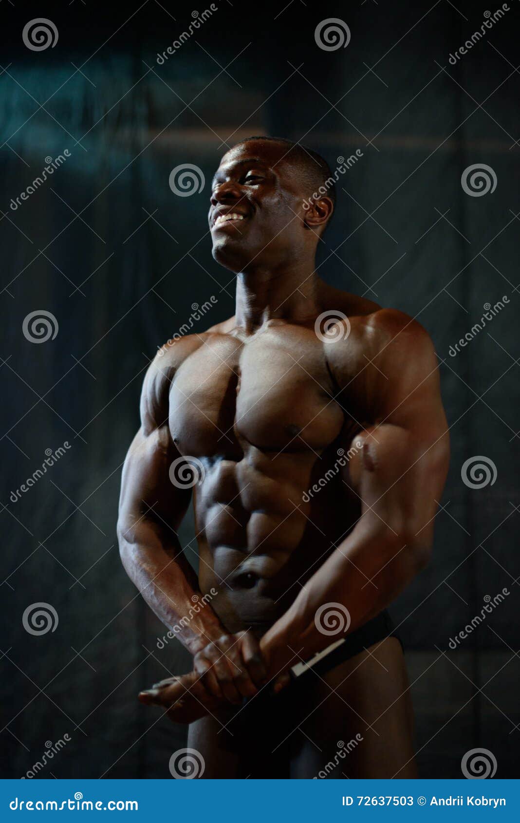 Portrait of Smiling African American Male Bodybuilder with Naked Torso  Posing on a Black Studio Background. Human S Body Stock Image - Image of  building, athlete: 72637503