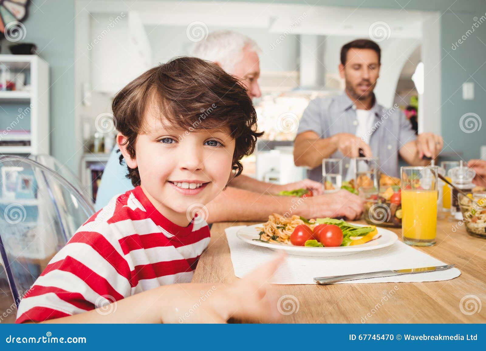 Portrait of Smiling Boy Sitting at Dining Table Stock Photo Image of