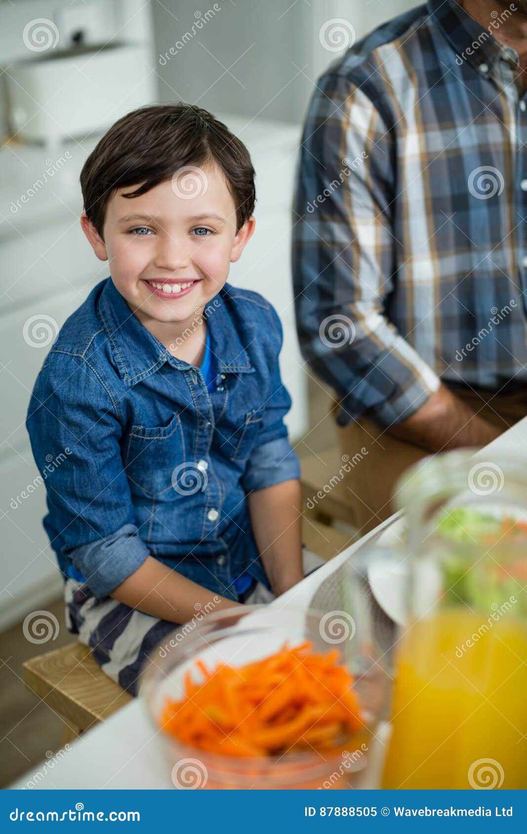 Portrait of Smiling Boy Sitting at Dining Table Stock Image Image of