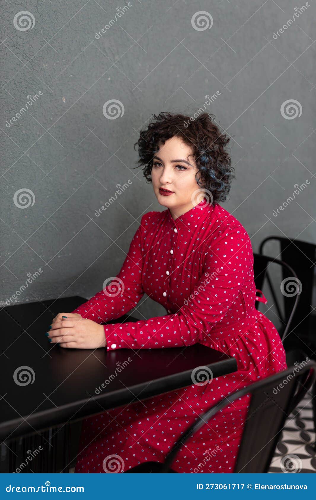portrait smiling brunette girl twenty five years old dressed vintage red dress pattern small purse bag 273061717