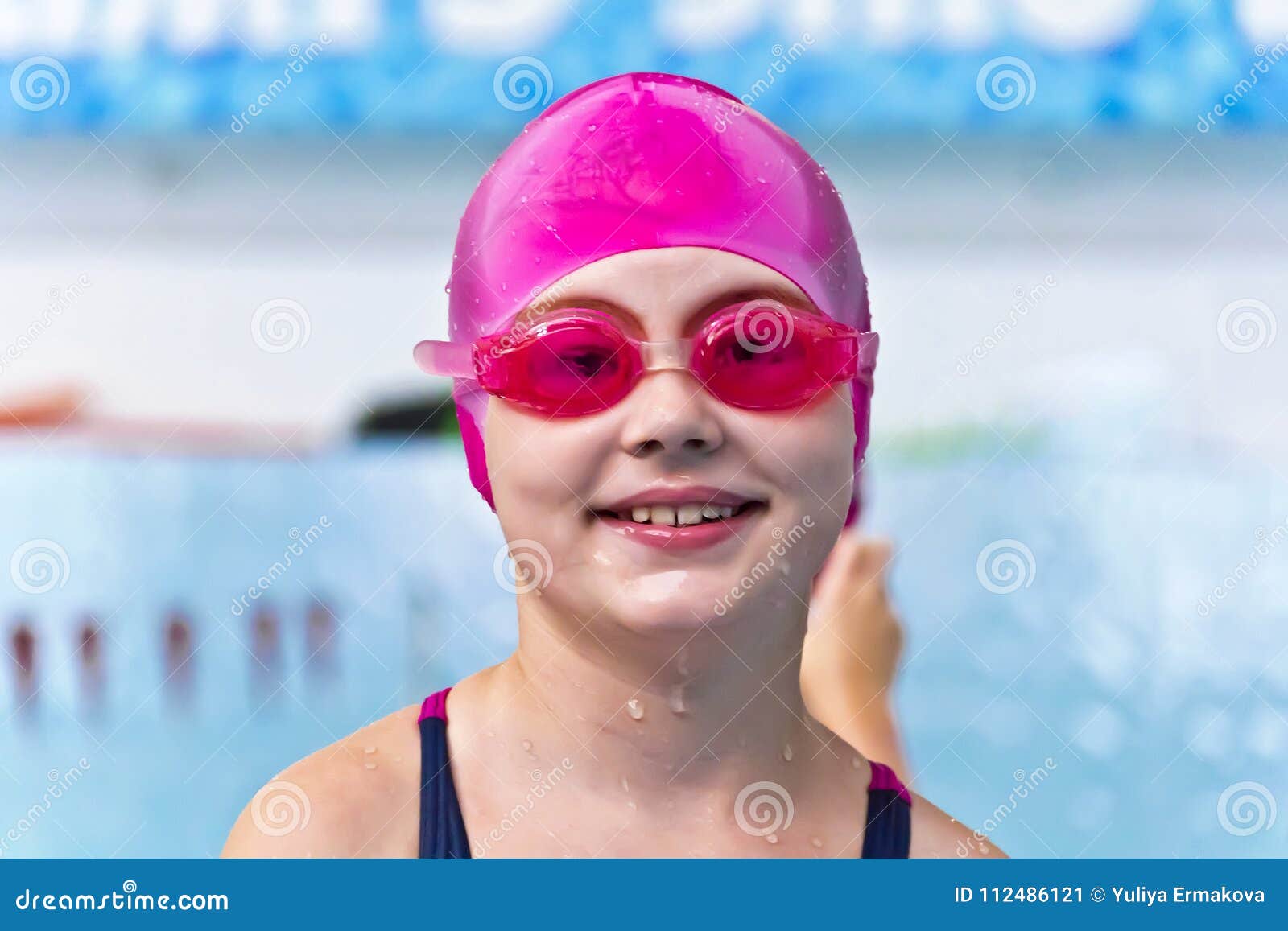 Girl in pink rubber hat stock image. Image of swimming - 112486121