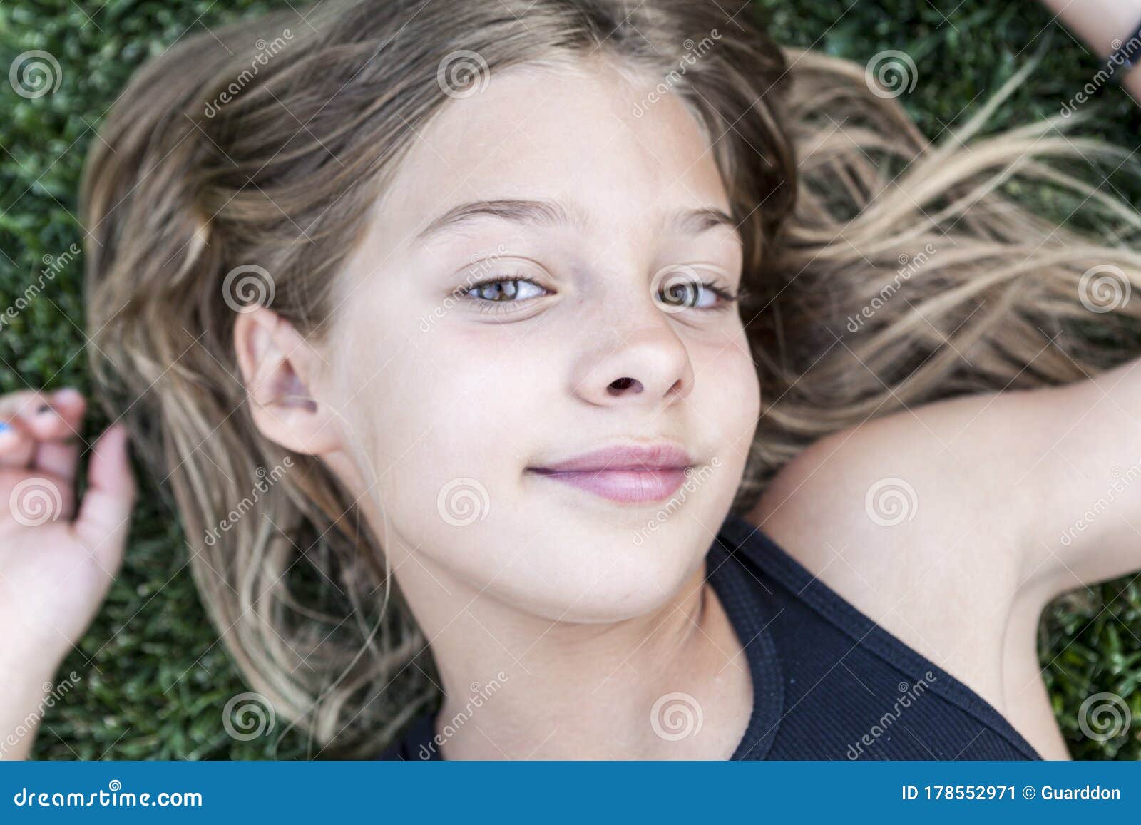 Cute Young Girl Having Fun on a Grass Stock Image - Image of ...
