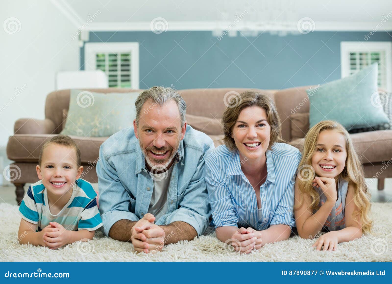 family lying in living room