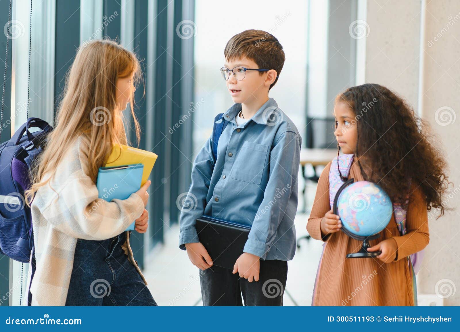 Portrait of Smiling Little School Kids in School Corridor Stock Image ...