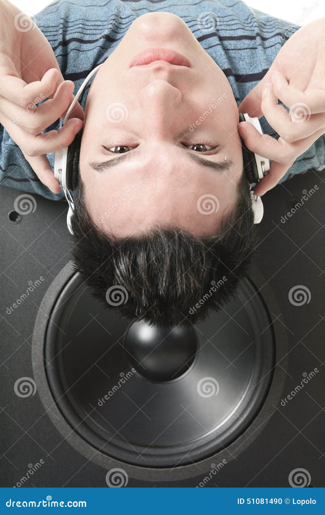 Portrait of a Smiling Male with Headphones Posing Stock Photo Image
