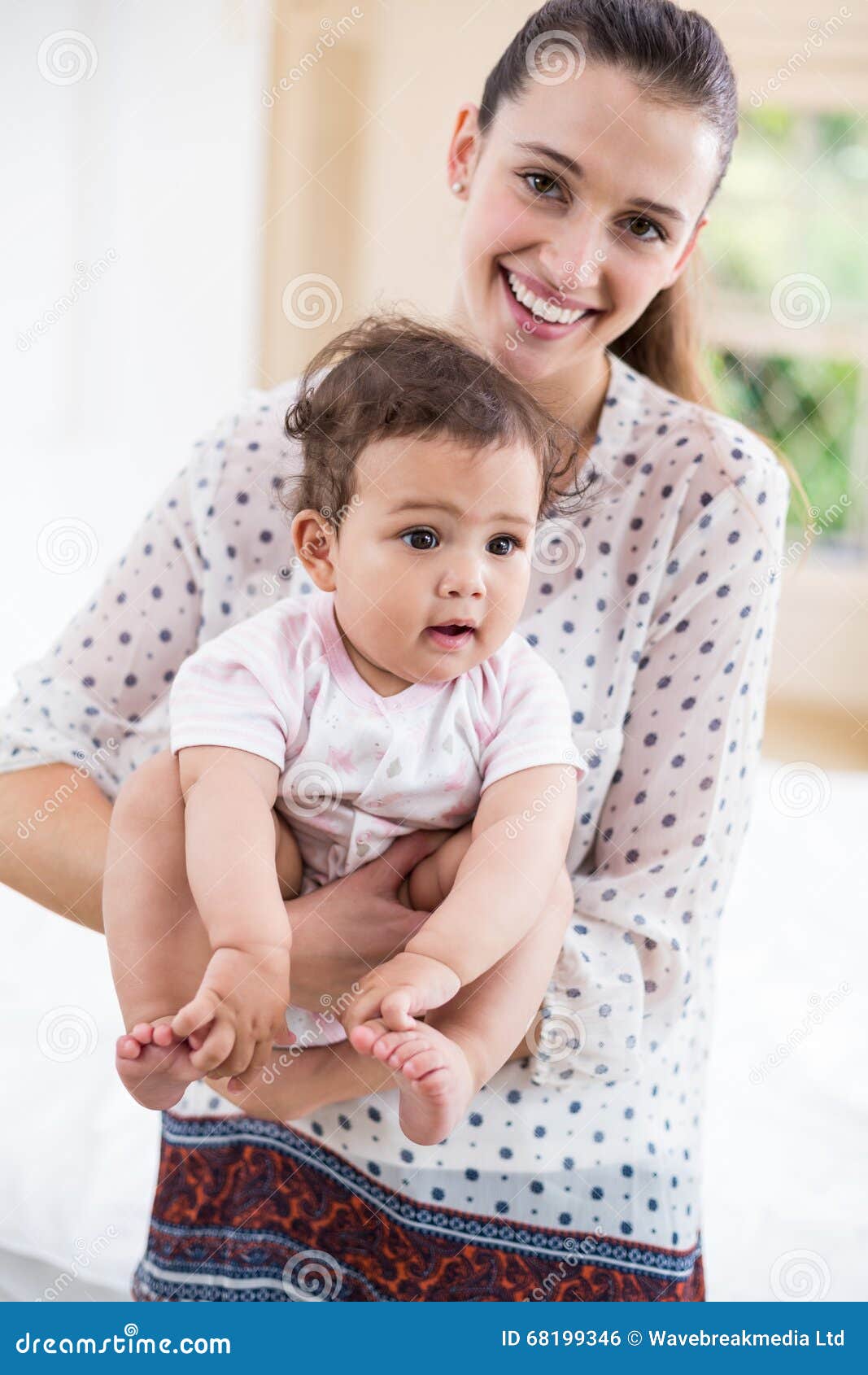 Portrait of Smiling Mother Carrying Cute Baby Stock Photo - Image of