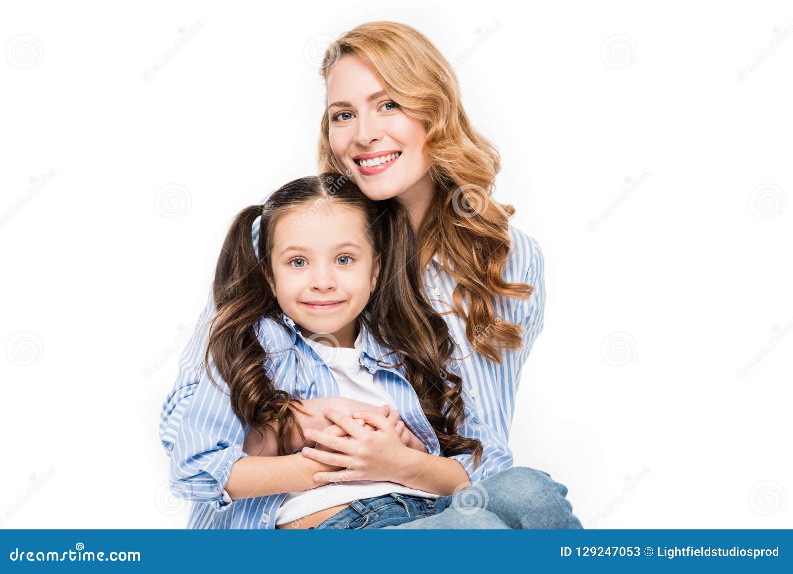 Download Portrait Of Smiling Mother Hugging Little Daughter Stock ...
