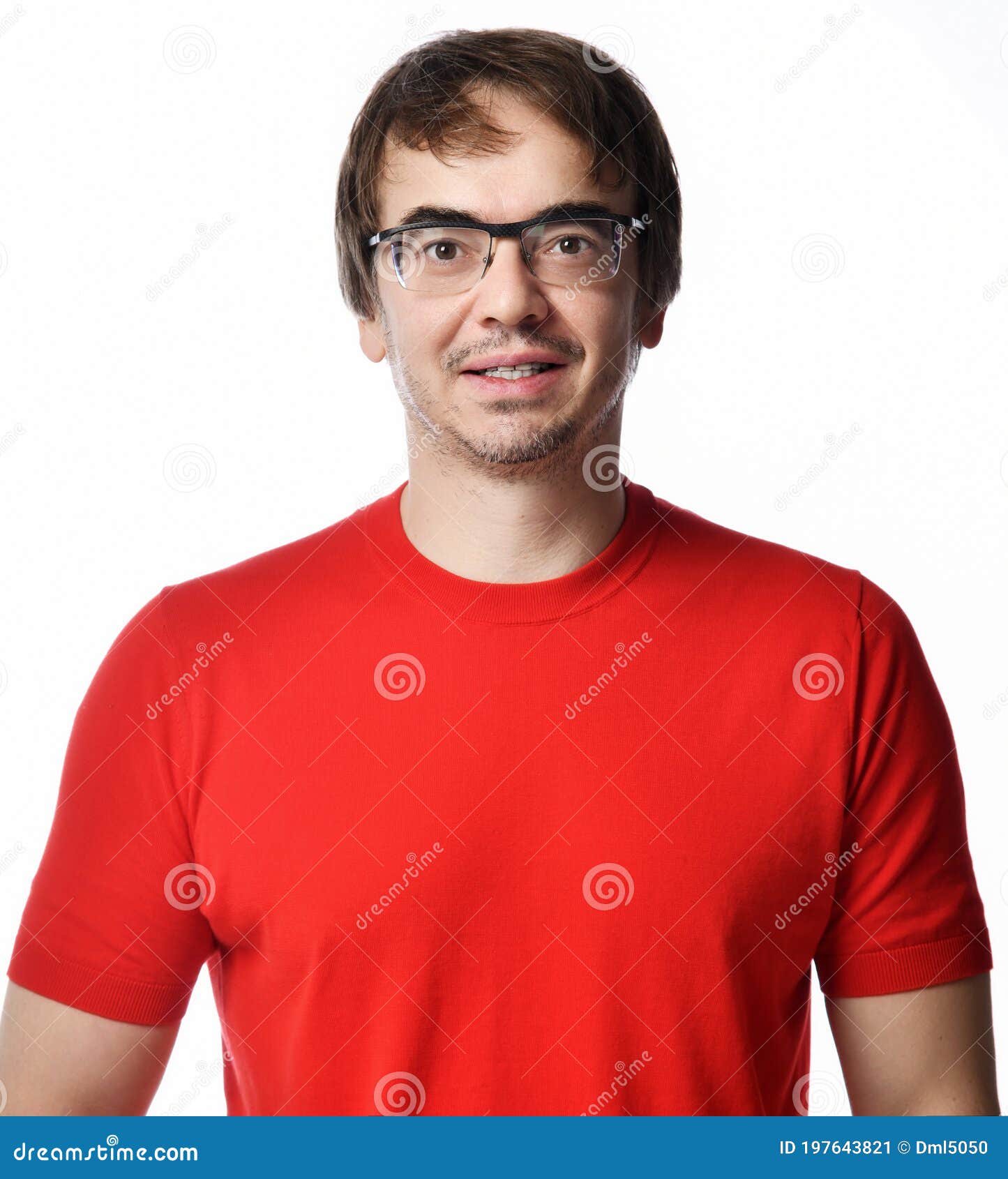 portrait of smiling positive excited unshaved man in glasses and red t-shirt retelling a story over white background