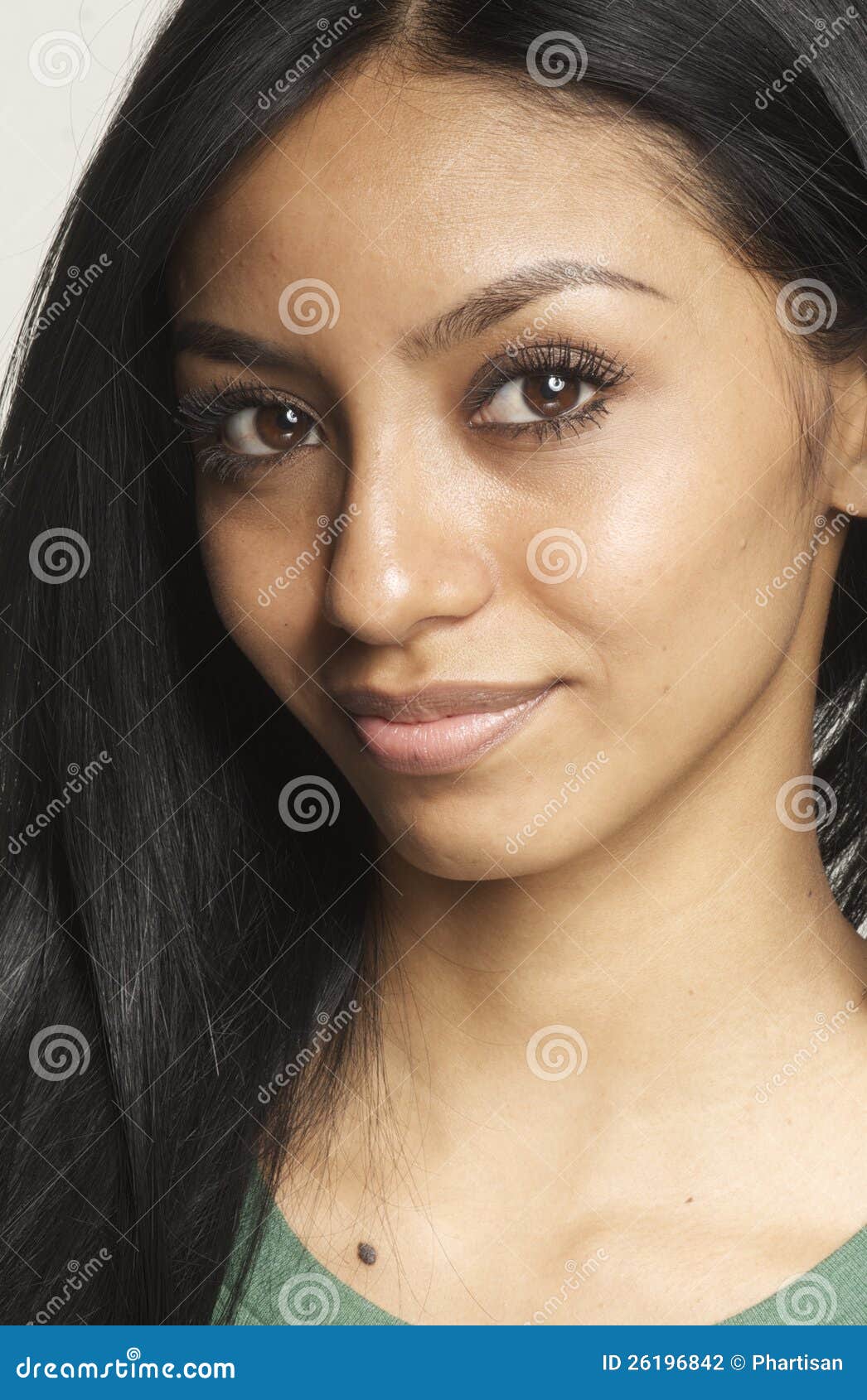 Portrait of a smiling pretty young teenage girl