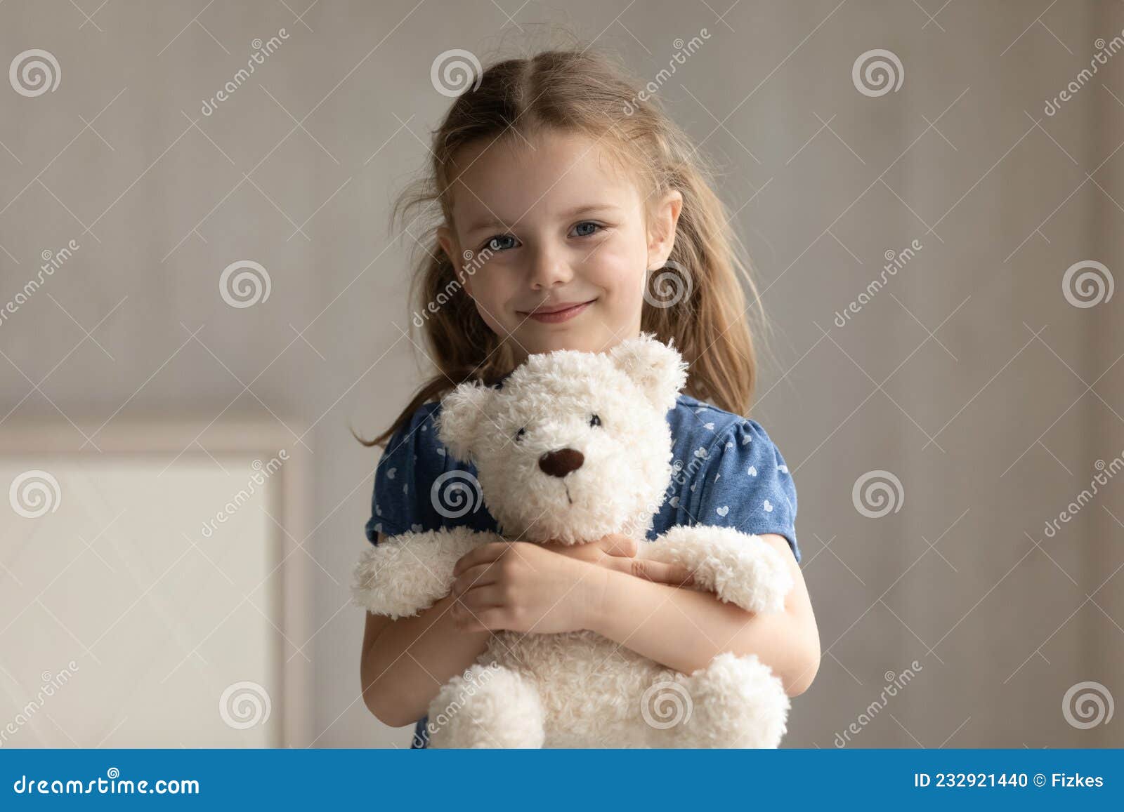 Portrait of Smiling Small Kid Girl Cuddling Favorite Fluffy Toy. Stock ...