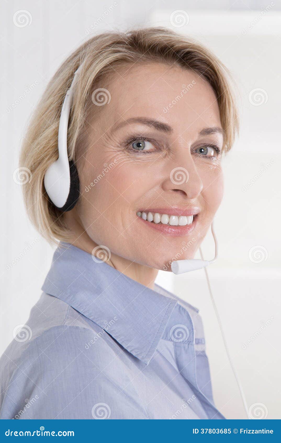 portrait of smiling woman with headphone on telesales.