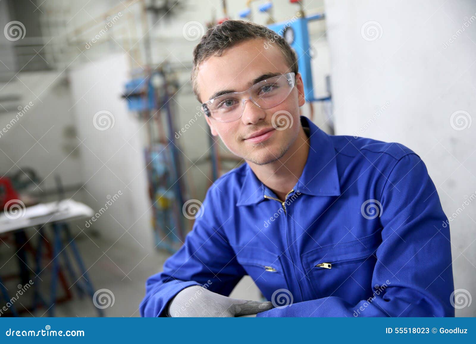 portrait of smiling young trainee in plumbery