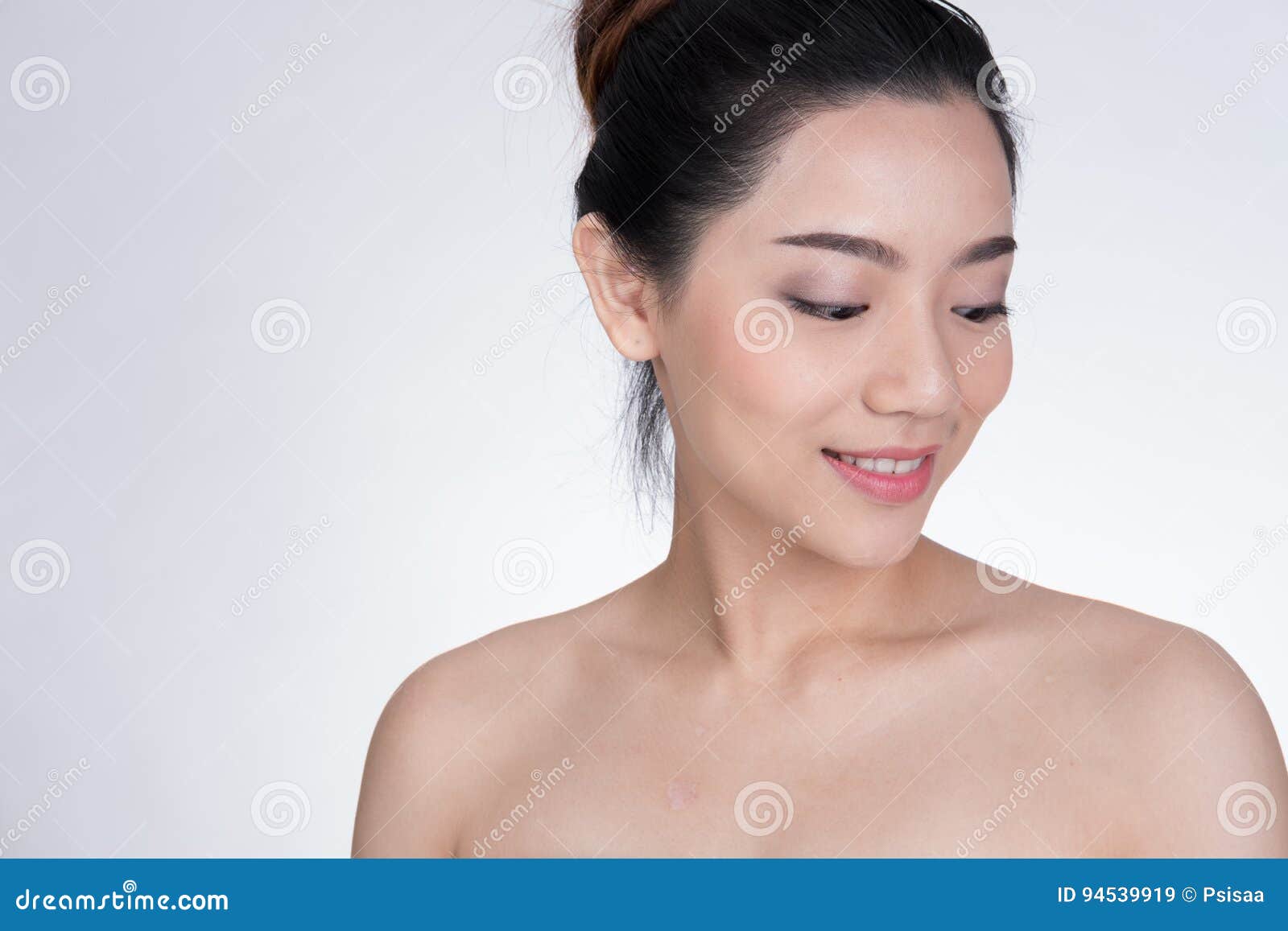 1300px x 957px - Portrait Of A Smiling Young Woman With Natural Make-up ...