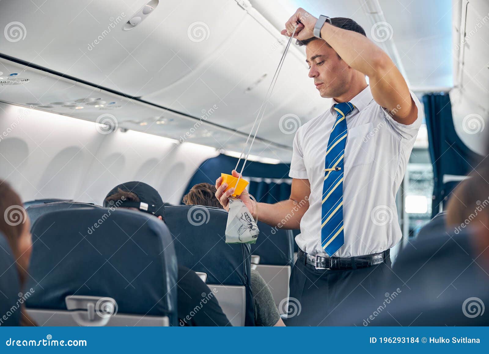 Be Safe safety information brochure in seat pocket on plane Stock Photo -  Alamy