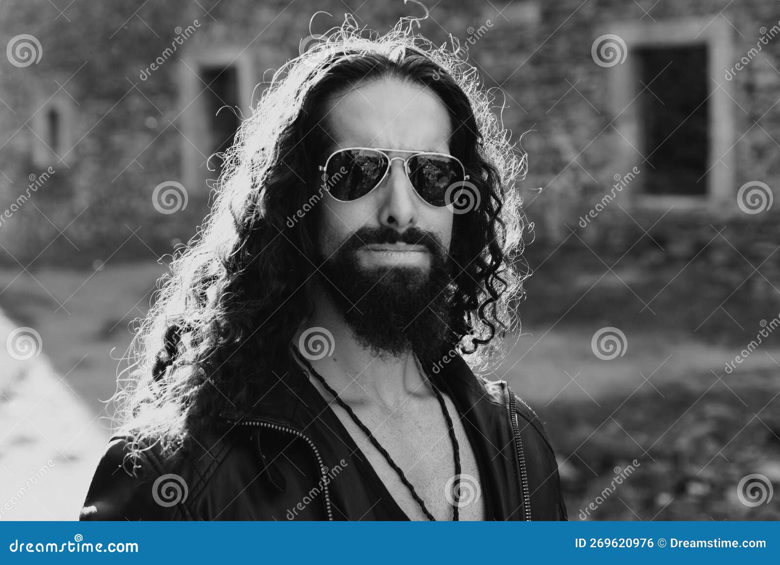 Portrait of Stylish Handsome Young Man with Sunglasses. Aviator. Stock