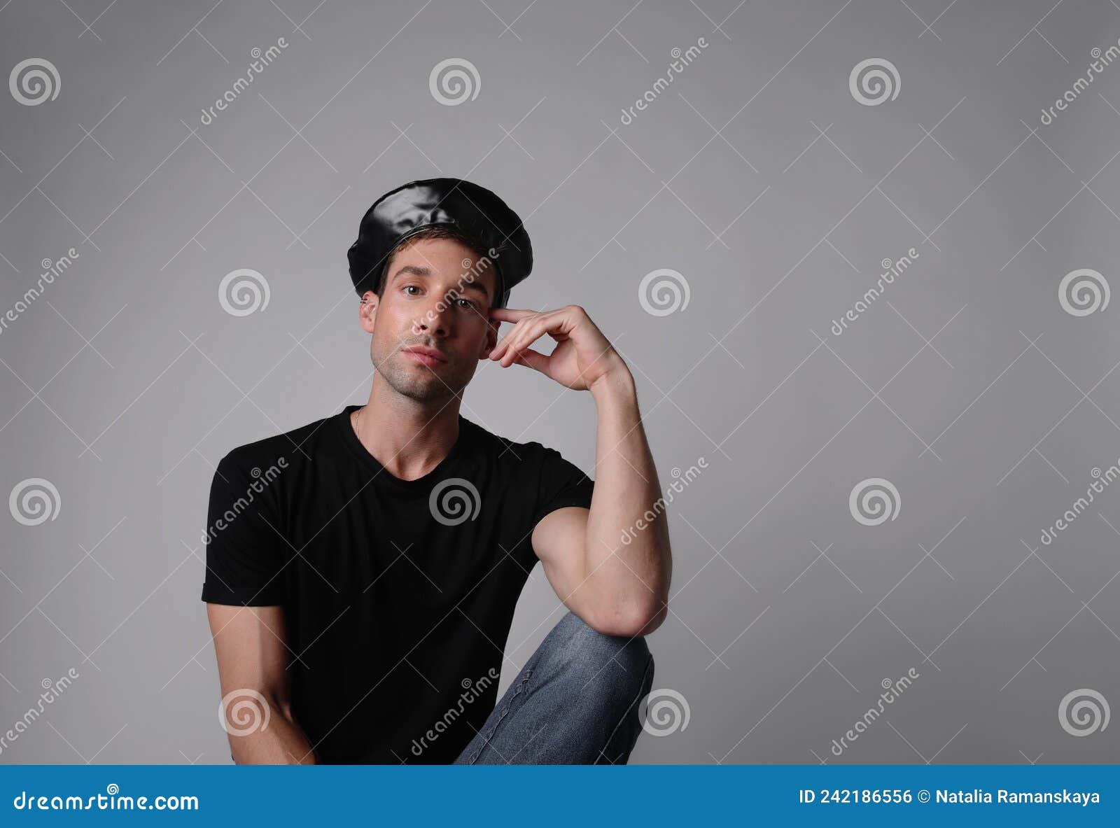 portrait of stylish young man with serious face expression. white background.