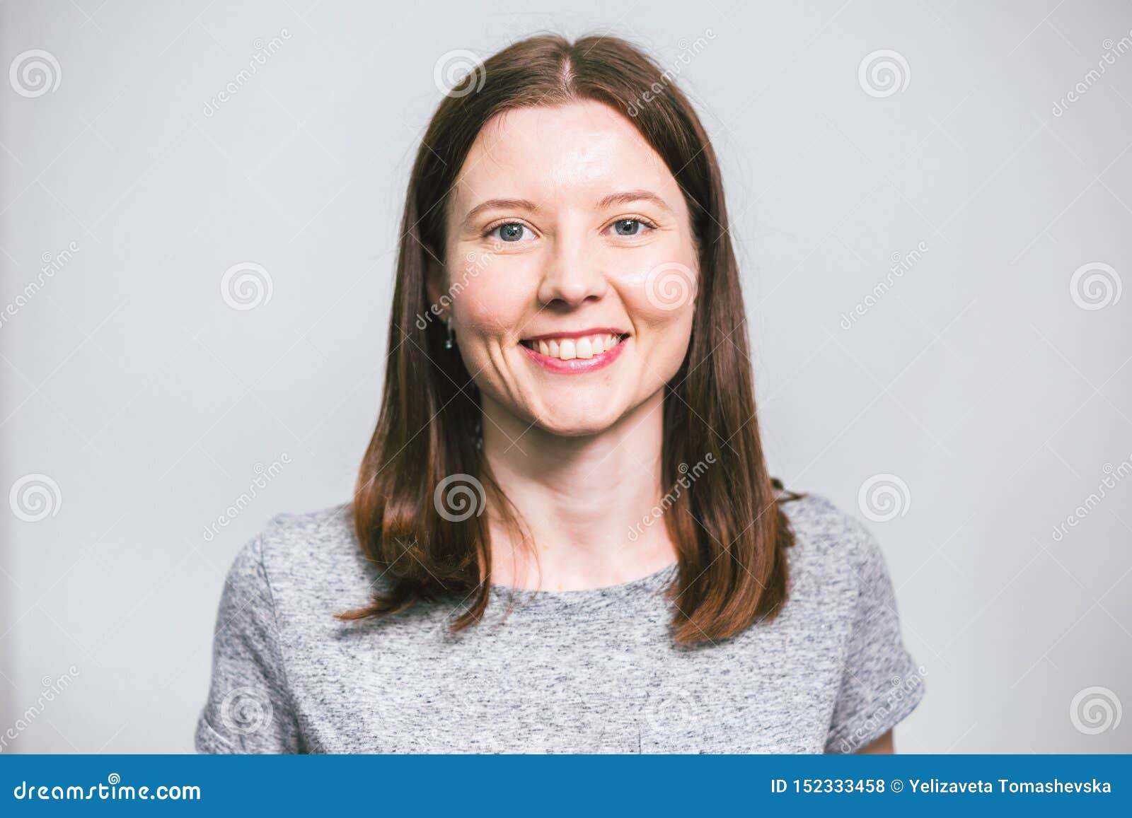 Portrait of Stylish Young Pretty Caucasian Woman Smiling in Grey T ...