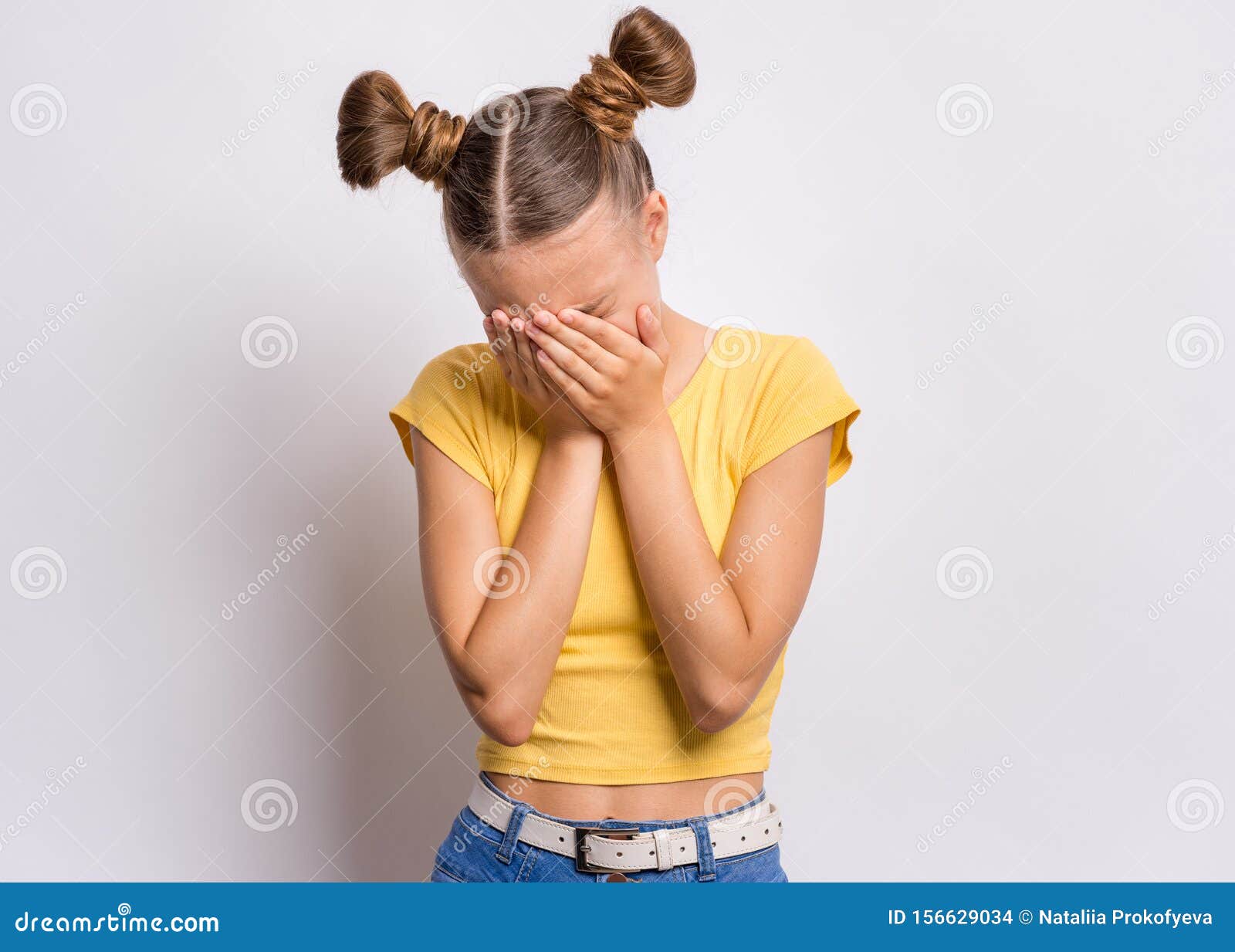 Premium Photo  Child girl sad profile face close up with hands on