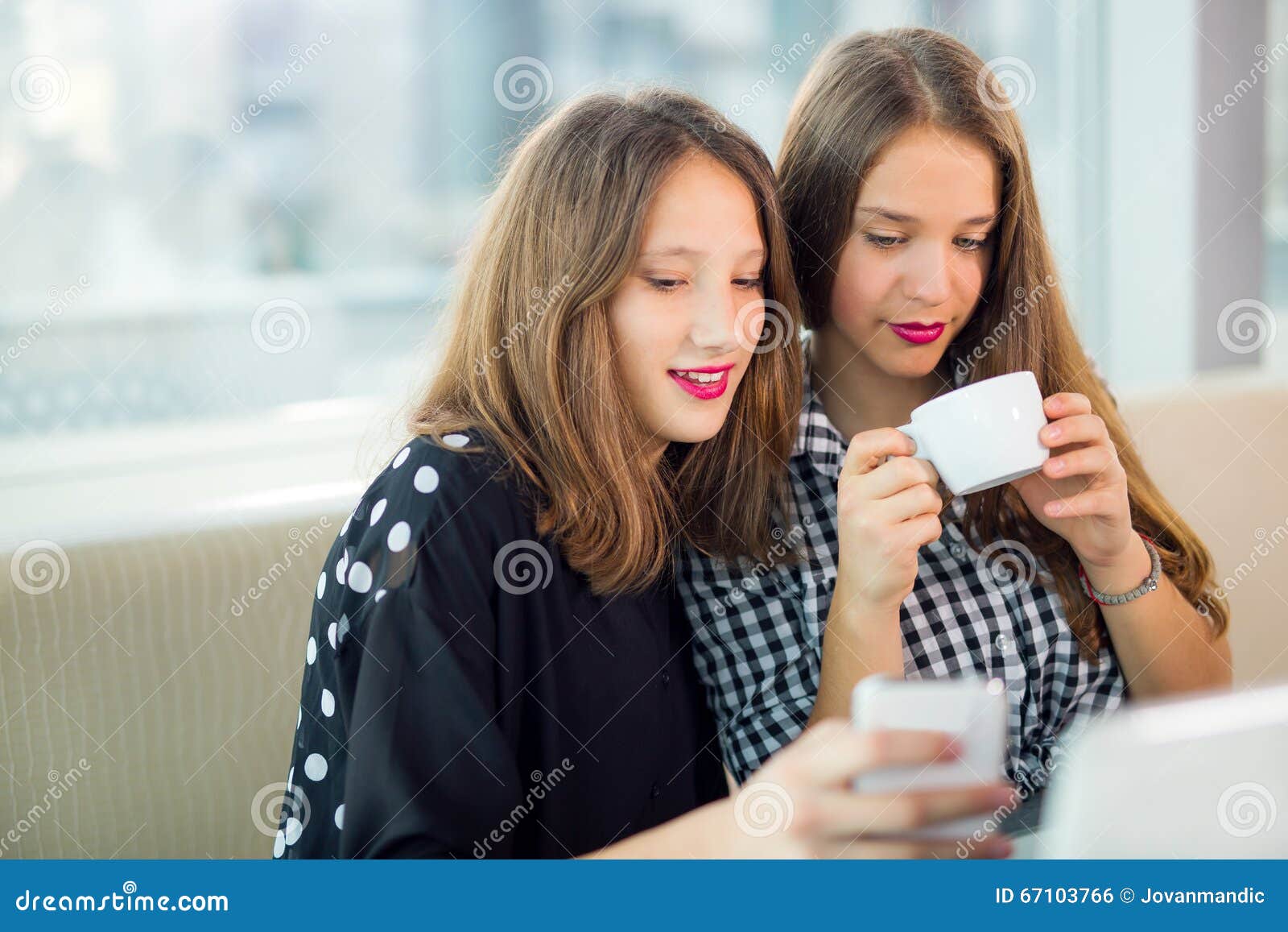 Portrait of Teenager Girls Sitting at the Table in the Cafe Stock Photo ...