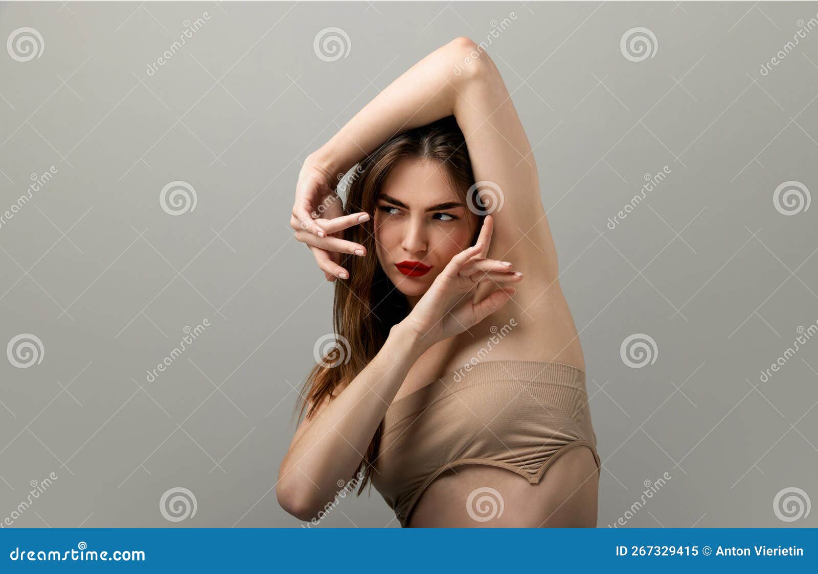 Foto de Beautiful young women in underwear on color background do