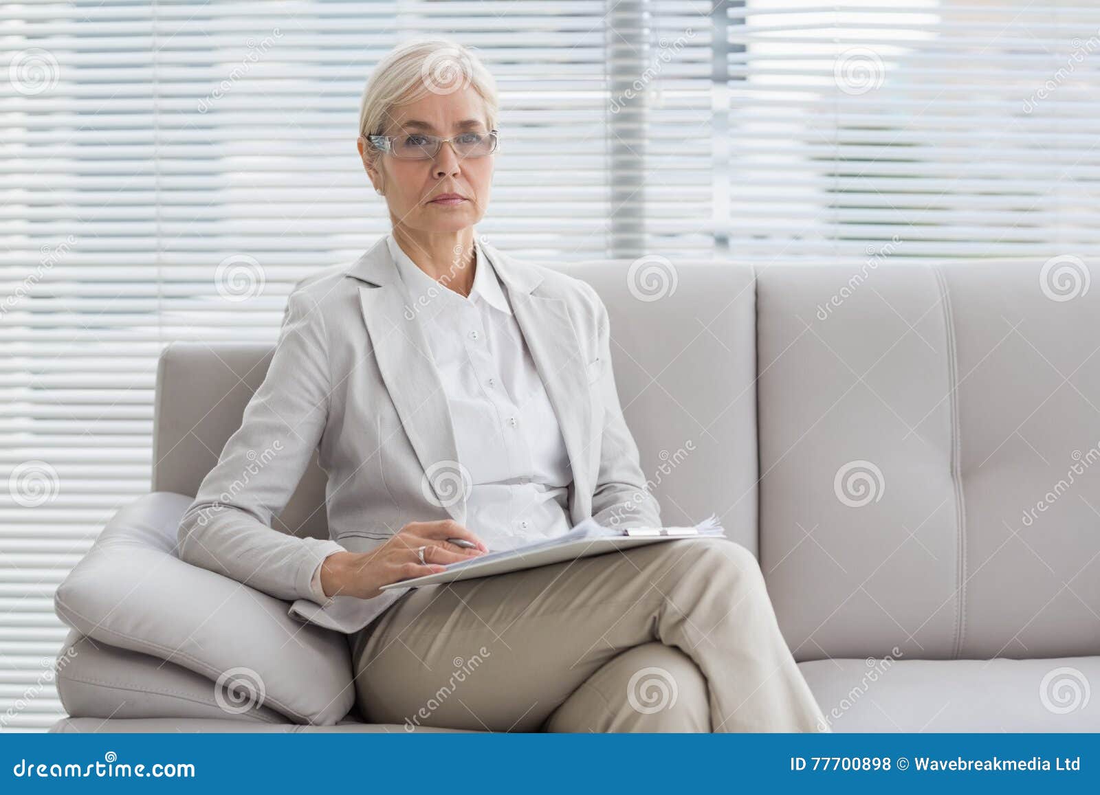 Portrait of Therapist Sitting on Sofa Stock Photo Image of analysis