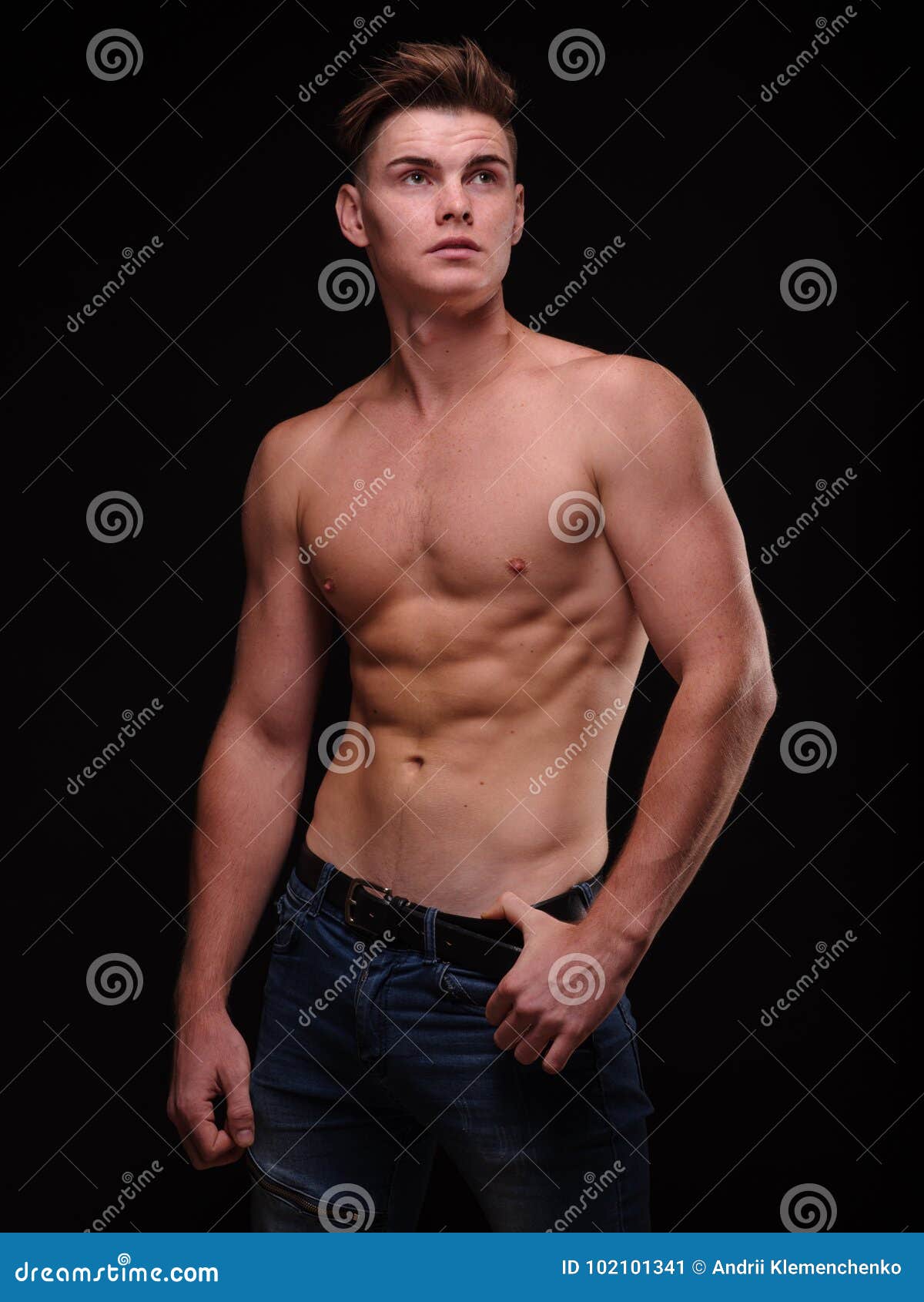 Healthy Teenage Guy Shirtless on a Black Background. Sporty Young Men ...