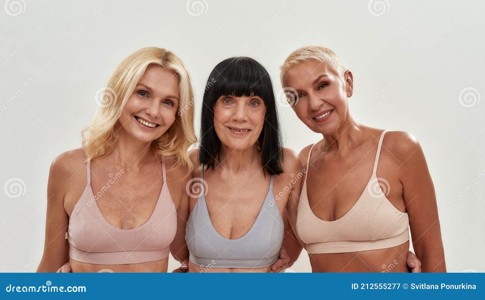 Portrait of Three Happy Attractive Middle Aged Women in Underwear Embracing  Each Other, Smiling at Camera while Standing Stock Image - Image of  lingerie, female: 212555277