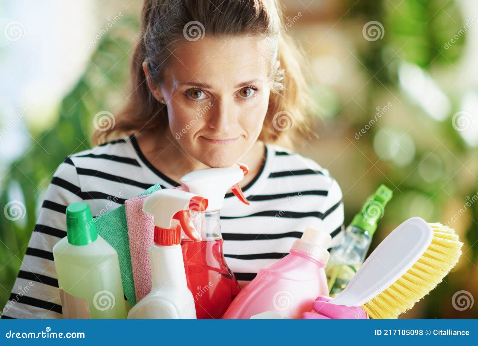 Portrait of Tired Woman in Striped Shirt at Home in Sunny Day Stock ...