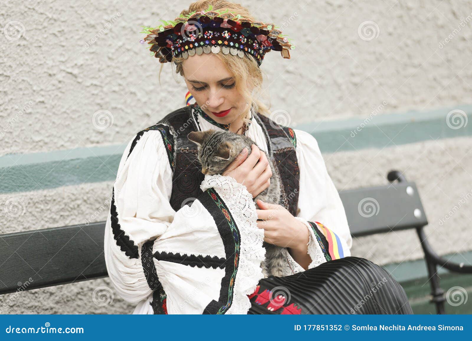 beautiful woman dressed in traditional romanian costume