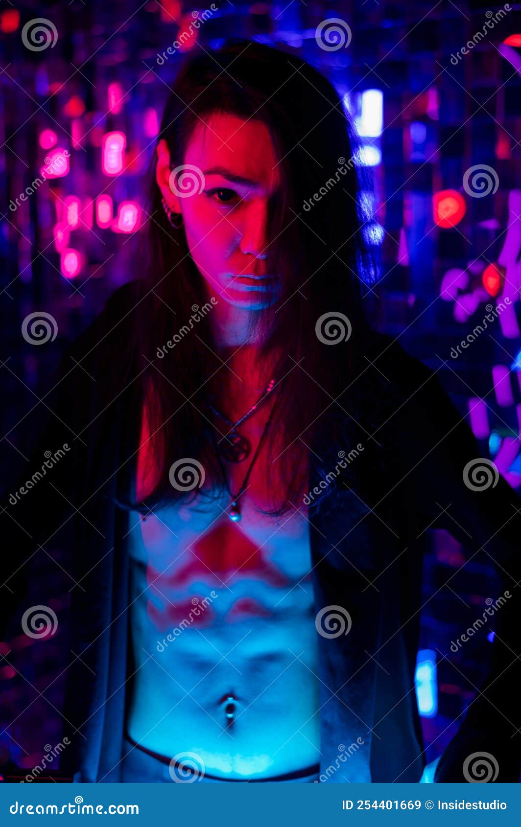 Portrait of a Transgender Model with a Naked Torso in a Studio with