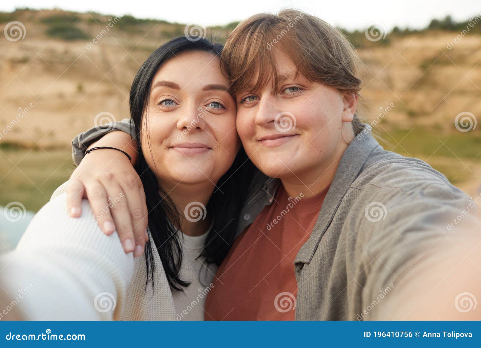 Mom and daughter outdoor lesbian adventure