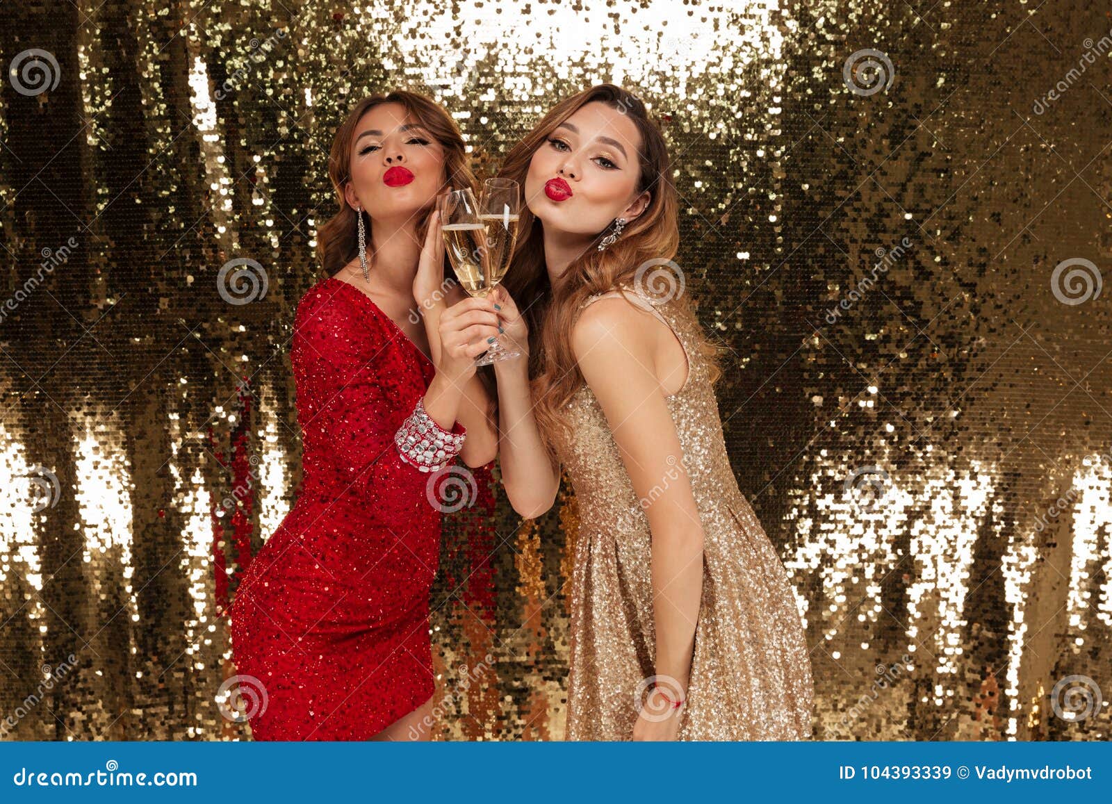 Portrait of Two Joyful Pretty Girls in Shiny Dresses Stock Image ...
