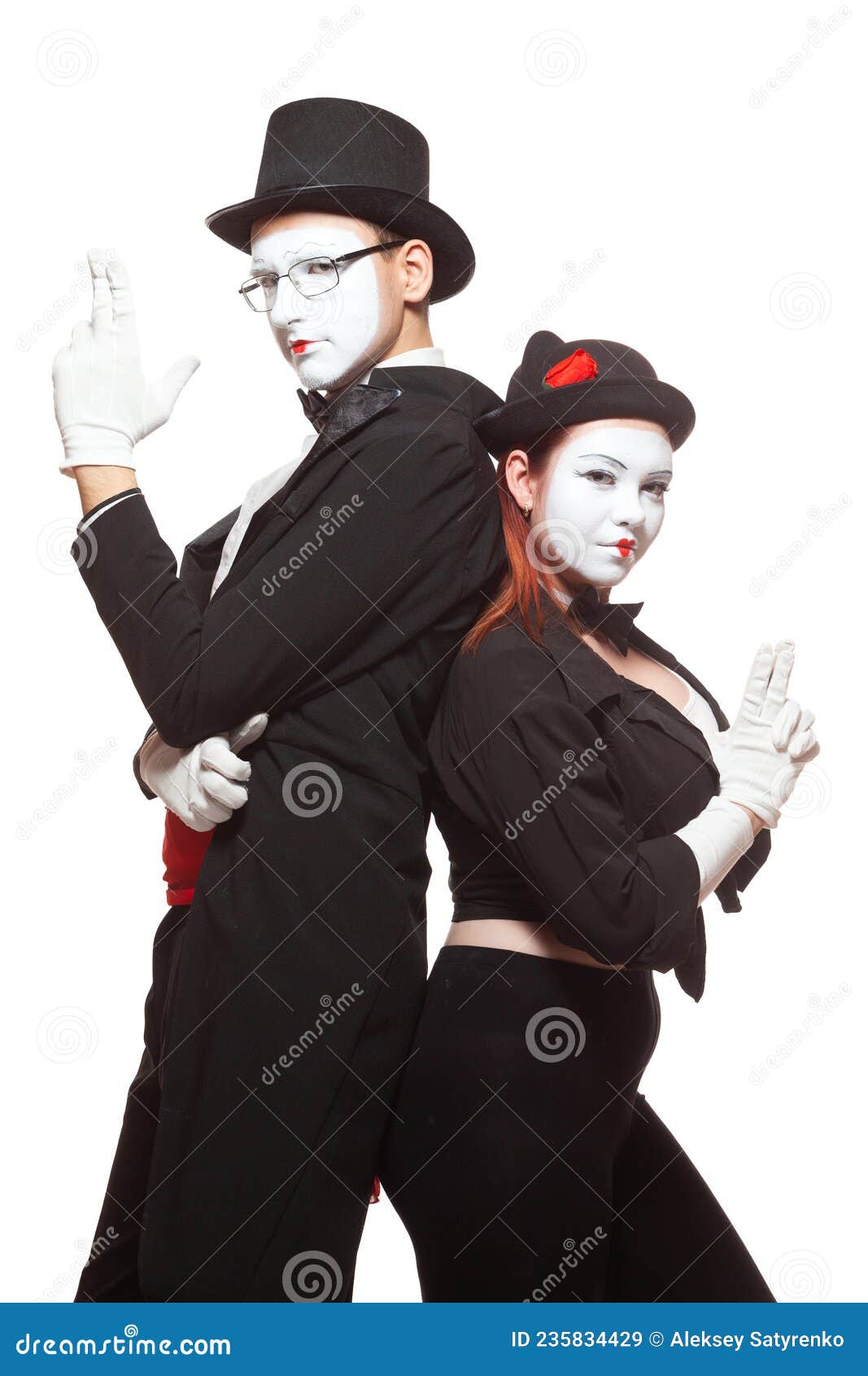 Portrait Of Two Mime Artists Performing Isolated On White Background