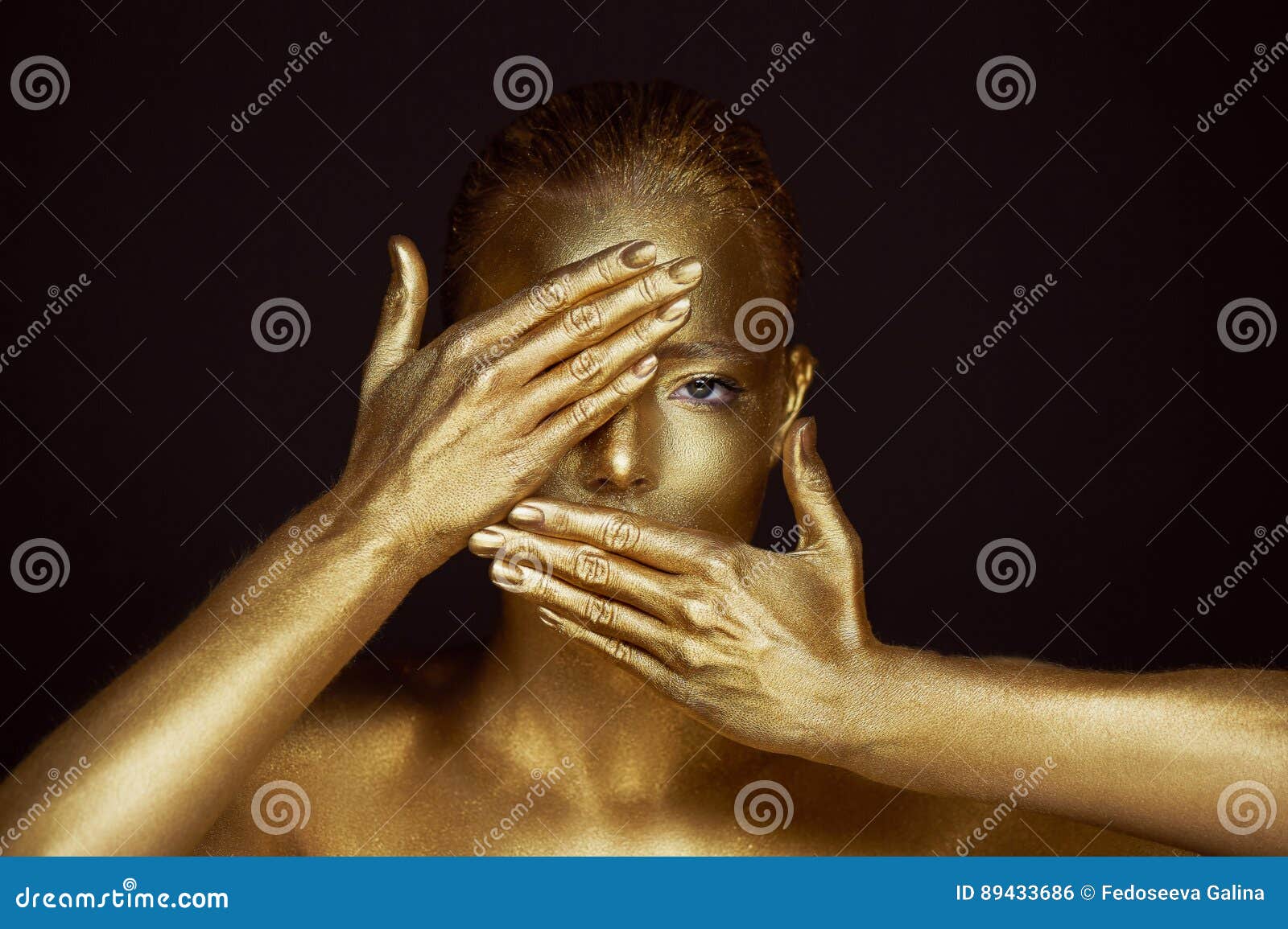 portrait unearthly golden girls, hands near the face. very delicate and feminine. the eyes are open. frame of hands