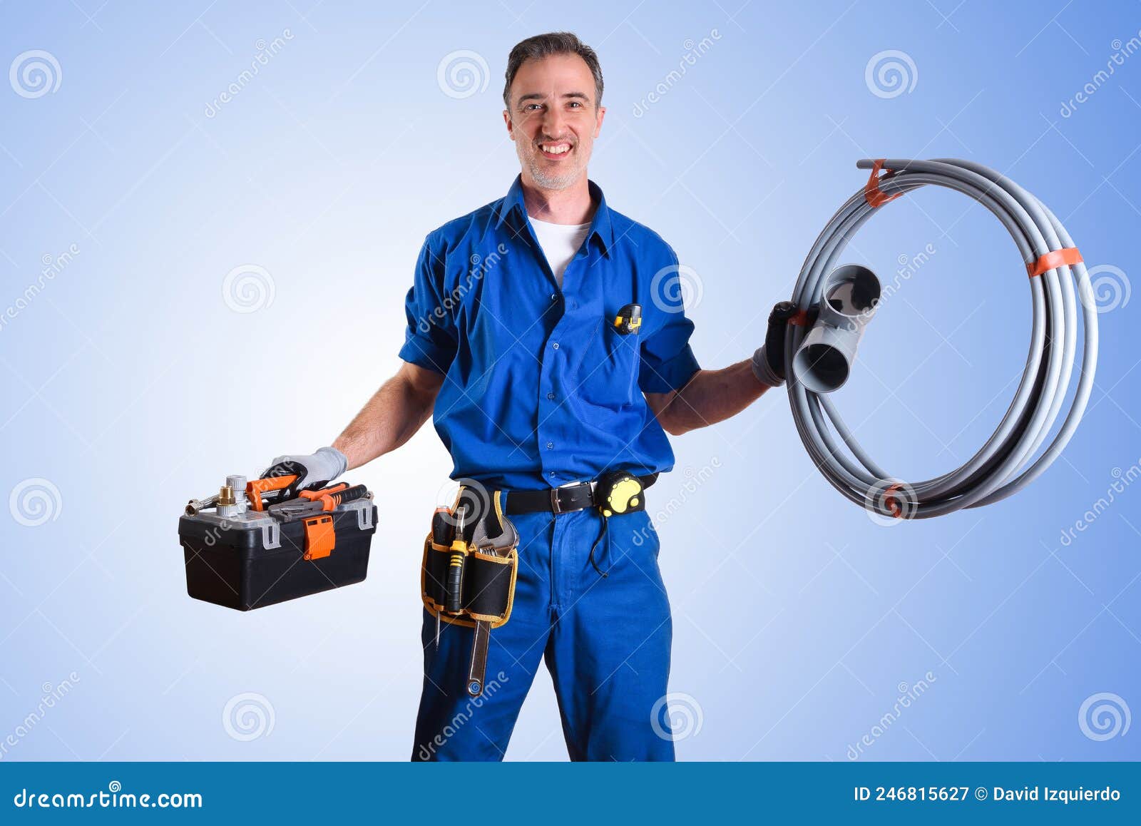 Portrait of Uniformed Plumber with Work Tools and Isolated Background