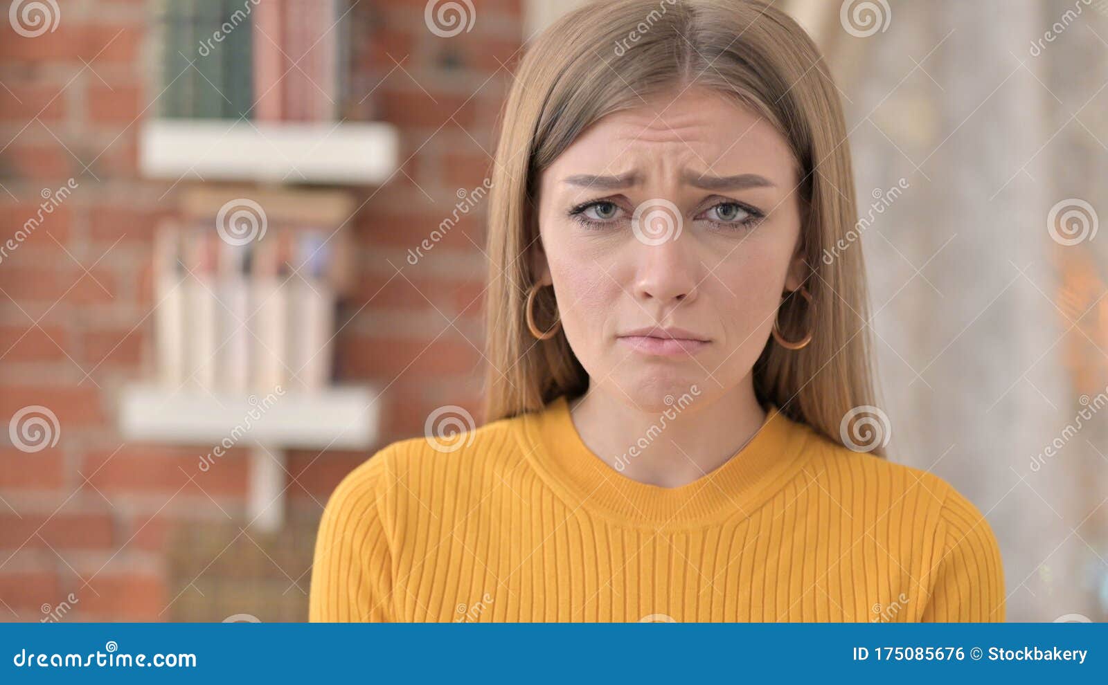 Portrait of Upset Young Woman Crying at the Camera Stock Photo Image
