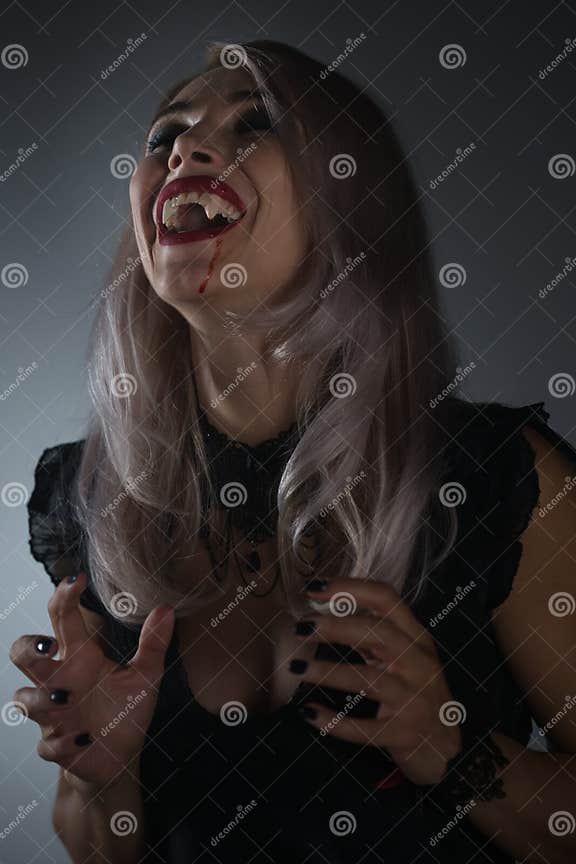 Portrait of Vampire Woman with a Bloody Mouth and Teeth Fangs C Stock ...