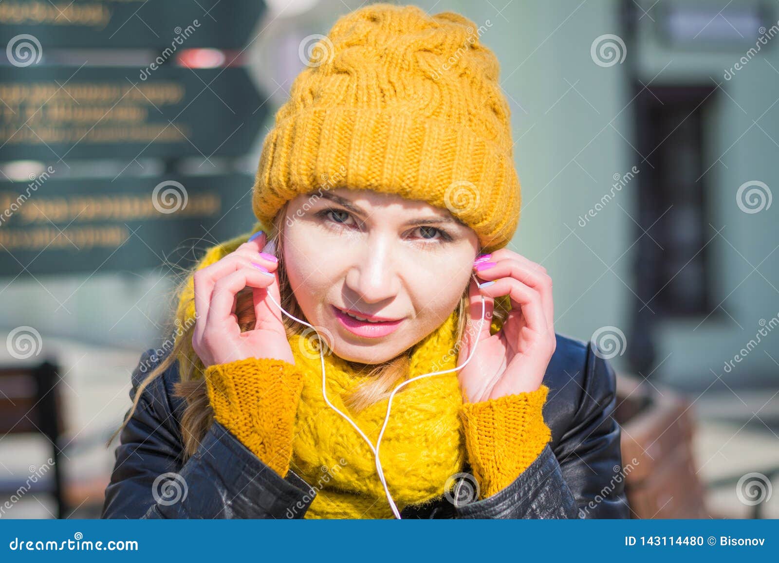 Portrait of a Very Attractive Woman in a Knitted Hat and Scarf with ...