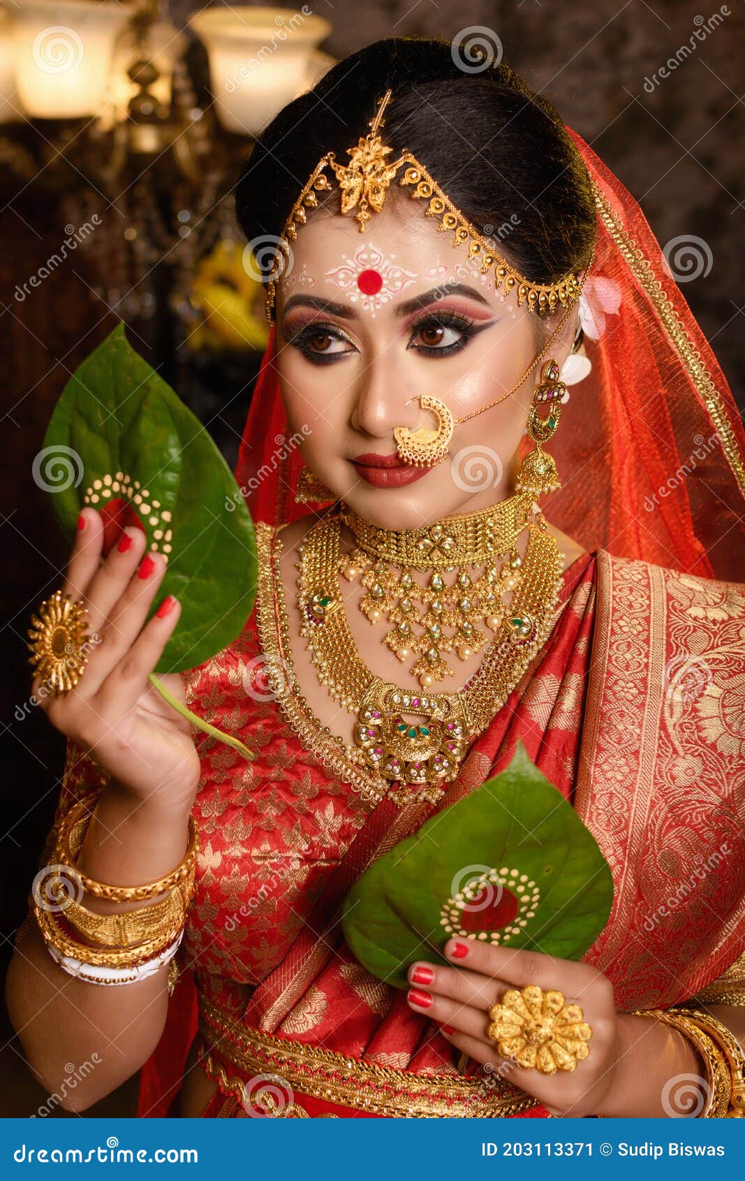 Portrait of Very Beautiful Indian Bride Holding Betel Leaf ...
