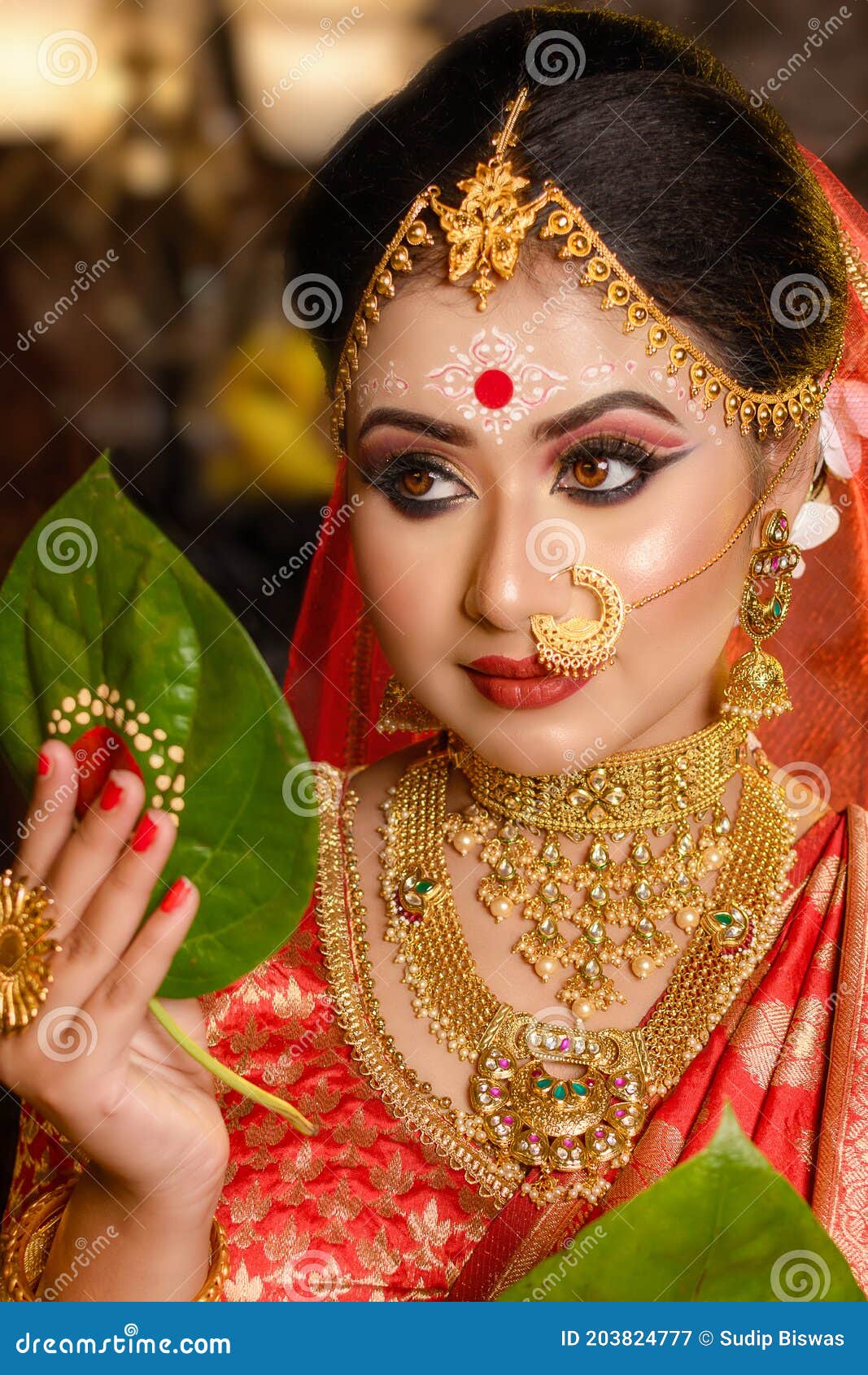 Portrait of Very Beautiful Indian Bride Holding Betel Leaf ...